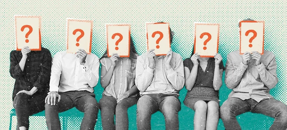 People sitting in a row of chairs with question marks over their faces